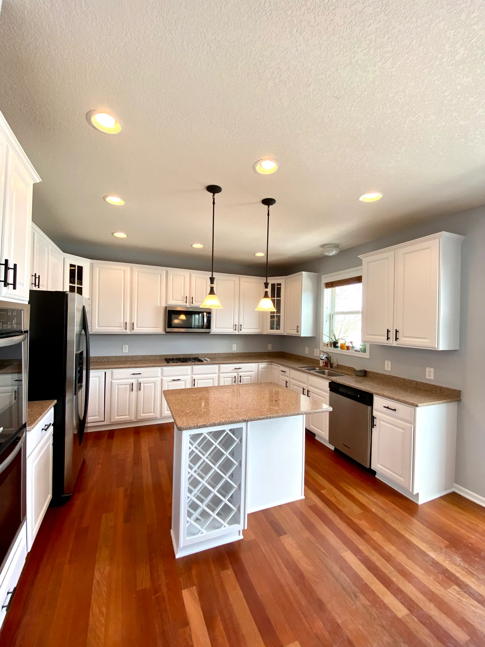 Kitchen with cabinets painted white