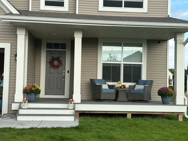 Front porch with decking and trim painted