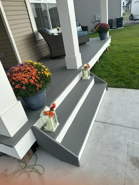 Porch steps and decking painted grey with white trim